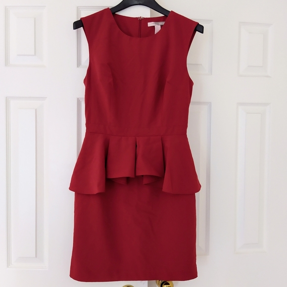 Red Sleeveless Peplum Dress - Picture 2 of 8